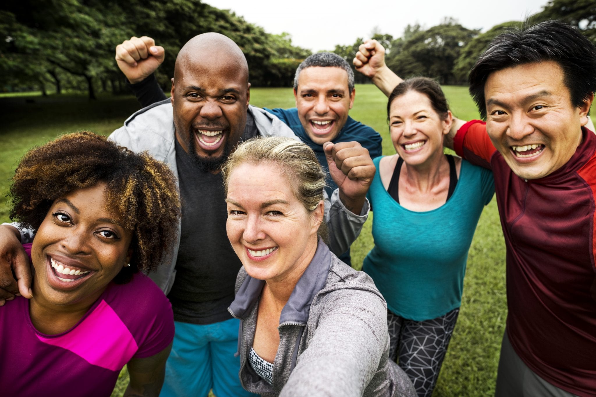 Group Of Cheerful Diverse Friends In The Park Double Jj Resort