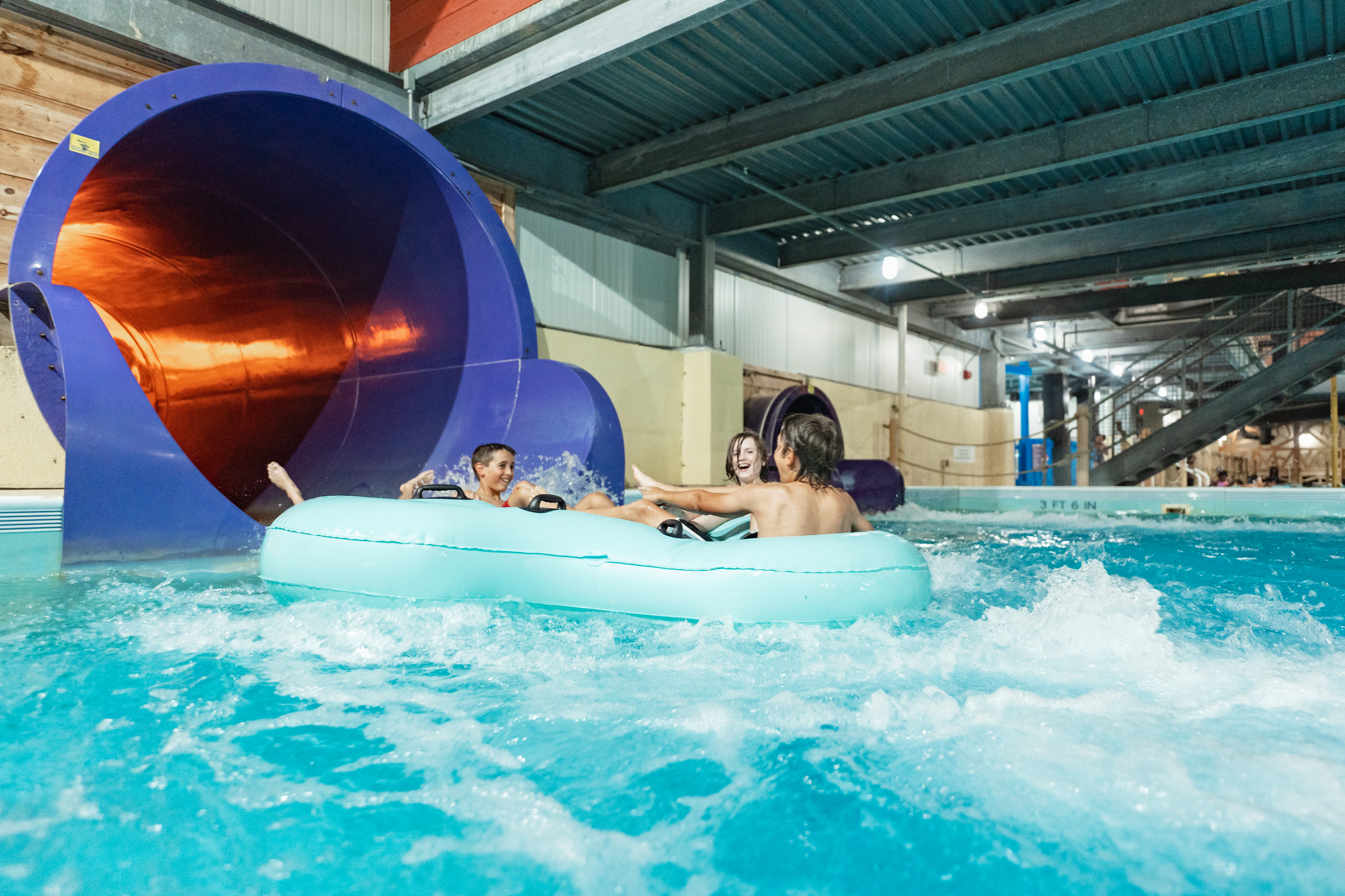 Guests enjoying the Gold Rush Indoor Waterpark at Double JJ Resort
